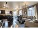 Open-concept living space showcasing hardwood floors, dining area, and kitchen at 17150 N 23Rd St # 125, Phoenix, AZ 85022