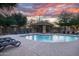 Relaxing community pool with lounge chairs and a shaded gazebo at 17150 N 23Rd St # 125, Phoenix, AZ 85022