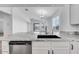 The kitchen has granite countertops, stainless steel appliances, a sink, and an open floor plan at 18153 W Hiddenview Dr, Goodyear, AZ 85338