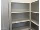 Walk-in pantry with multiple shelves for organized storage at 18248 W La Senda Dr, Surprise, AZ 85387