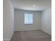 A comfortable bedroom offers soft carpeting, ample natural light, and a calming atmosphere at 18269 W Camino De Oro --, Surprise, AZ 85387