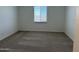 Bedroom features carpet, neutral paint, and a window with blinds at 18269 W Camino De Oro --, Surprise, AZ 85387
