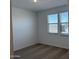 Bright bedroom with neutral carpet, dual windows and a view of the desert at 18269 W Camino De Oro --, Surprise, AZ 85387