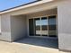 Covered patio with sliding glass door to the living room at 18269 W Camino De Oro --, Surprise, AZ 85387