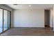 Bright and airy living space featuring tile floors and sliding glass doors for a seamless indoor-outdoor flow at 18269 W Camino De Oro --, Surprise, AZ 85387