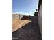 Large, fenced backyard ready for landscaping and outdoor activities at 1841 N Wilbur Cir, Mesa, AZ 85201