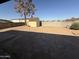 Backyard with a storage shed and block wall at 1841 N Wilbur Cir, Mesa, AZ 85201