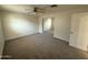 Spacious bedroom with neutral carpet and a mirrored closet at 1841 N Wilbur Cir, Mesa, AZ 85201