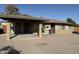 Inviting single-Gathering home featuring a covered porch and xeriscaped landscaping at 1841 N Wilbur Cir, Mesa, AZ 85201