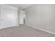 Bedroom with closet and a doorway leading to another room at 2652 N 143Rd Dr, Goodyear, AZ 85395