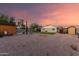 Backyard featuring a detached shed, privacy fence, and grass at 332 S 83Rd Pl, Mesa, AZ 85208
