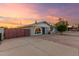 Inviting single-story home with a modern paint scheme and well-maintained landscaping at 332 S 83Rd Pl, Mesa, AZ 85208
