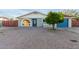 Attractive home featuring a well-manicured yard and updated exterior paint, creating curb appeal at 332 S 83Rd Pl, Mesa, AZ 85208