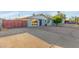 Quaint home with mature tree, showcasing its inviting entrance and well-kept surroundings at 332 S 83Rd Pl, Mesa, AZ 85208