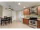 The eat-in kitchen has stainless steel appliances and granite counters at 332 S 83Rd Pl, Mesa, AZ 85208
