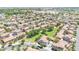 Aerial view of homes surrounding a community park; a lush, green space enhances the neighborhood's appeal at 3898 E Palmer St, Gilbert, AZ 85298