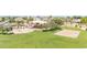 The community park features a playground, volleyball court, and a picnic area, surrounded by lush landscaping and green space at 3898 E Palmer St, Gilbert, AZ 85298