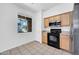 Bright kitchen featuring stainless steel appliances, and tile flooring at 3898 E Palmer St, Gilbert, AZ 85298