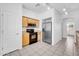 Functional kitchen featuring stainless steel appliances and tile flooring at 3898 E Palmer St, Gilbert, AZ 85298