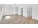 Expansive main bedroom with en suite bathroom and walk-in closet, and wood-style flooring at 3898 E Palmer St, Gilbert, AZ 85298