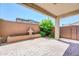 Covered patio featuring beautiful pavers, a serene fountain, and lush landscaping for outdoor enjoyment at 3898 E Palmer St, Gilbert, AZ 85298