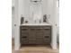 Modern bathroom with wood vanity, spacious countertop, and sleek hardware fixtures at 4220 N 32Nd St # 14, Phoenix, AZ 85018