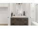 Stylish bathroom features a modern vanity with sleek countertop and unique decorative accents at 4220 N 32Nd St # 14, Phoenix, AZ 85018