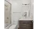 Elegant bathroom with glass shower and stylish vanity with modern lighting at 4220 N 32Nd St # 14, Phoenix, AZ 85018