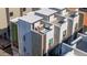Stunning aerial view of contemporary townhomes with private rooftop patios and a tranquil hot tub, blending luxury and relaxation at 4220 N 32Nd St # 14, Phoenix, AZ 85018
