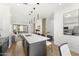 Open concept kitchen boasts a center island with lots of seating and wood floors at 4220 N 32Nd St # 14, Phoenix, AZ 85018