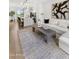 Open concept living room with modern decor, lighting and wood flooring at 4220 N 32Nd St # 14, Phoenix, AZ 85018