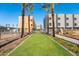 A view of a newly constructed community with modern architecture and manicured landscaping at 4220 N 32Nd St # 14, Phoenix, AZ 85018
