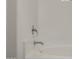 Close-up of a white bathtub with chrome fixtures at 4745 W Fremont Rd, Laveen, AZ 85339