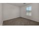 Bedroom with gray carpet and bright natural light at 4745 W Fremont Rd, Laveen, AZ 85339