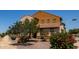 Beautiful two-story home with landscaping and mature trees at 4745 W Fremont Rd, Laveen, AZ 85339