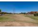 Scenic green space in the neighborhood with mature trees and open areas at 4745 W Fremont Rd, Laveen, AZ 85339