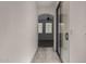 The hallway features neutral ceramic tile and a sliding glass door at 4745 W Fremont Rd, Laveen, AZ 85339
