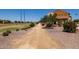Walking path near the house with beautiful landscaping and open space at 4745 W Fremont Rd, Laveen, AZ 85339