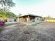 Large backyard with a covered patio, perfect for outdoor gatherings and relaxation at 4902 S Fair Ln, Tempe, AZ 85282