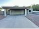 A cozy home with a covered front porch and ample driveway space at 4902 S Fair Ln, Tempe, AZ 85282