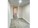 Neutral hallway features sleek tile floors and updated wall paint at 4902 S Fair Ln, Tempe, AZ 85282