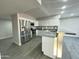 Spacious kitchen featuring granite countertops and stainless steel appliances at 4902 S Fair Ln, Tempe, AZ 85282