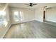 Living area featuring tile floors and double doors for outdoor access at 4902 S Fair Ln, Tempe, AZ 85282