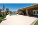 Expansive backyard patio featuring pool views and an outdoor dining area at 5737 W Hidalgo Ave, Laveen, AZ 85339