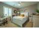 Bedroom with neutral walls, white trim, a ceiling fan, and carpeted floors at 5737 W Hidalgo Ave, Laveen, AZ 85339