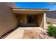 Close-up of the front entrance, showcasing the security door and covered porch area at 64 N 63Rd St # 25, Mesa, AZ 85205