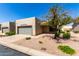 Inviting single-level home with an attached garage and desert landscaping for easy care at 64 N 63Rd St # 25, Mesa, AZ 85205