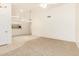 Open-concept living room that features tile and carpet flooring at 64 N 63Rd St # 25, Mesa, AZ 85205