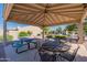 Community patio with picnic tables and seating area for relaxing or entertaining at 64 N 63Rd St # 25, Mesa, AZ 85205