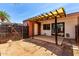 Backyard patio, privacy fence, and backyard storage at 6606 N 46Th Ave, Glendale, AZ 85301